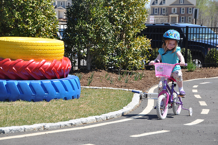 little girl riding bike